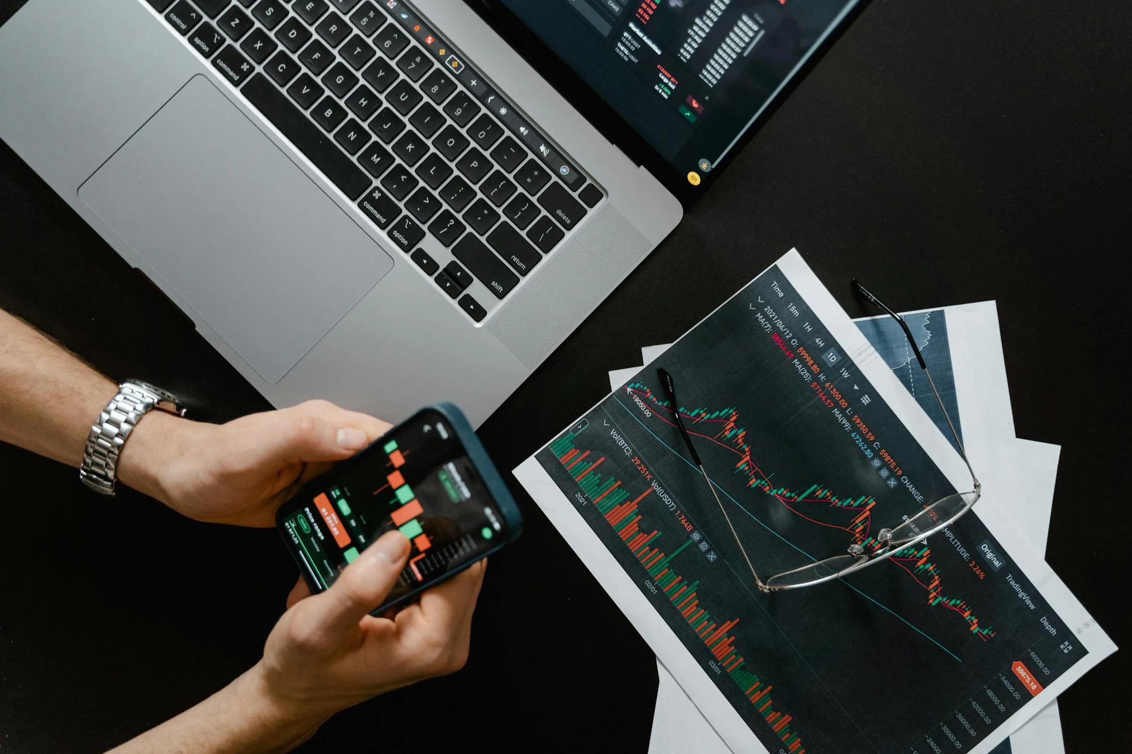 Business professional analyzing data on laptop computer screen