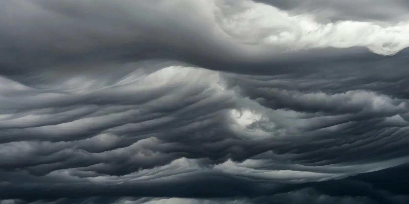 Heavy storm clouds rolling across the sky